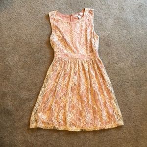 Adorable peach dress with lace overlay